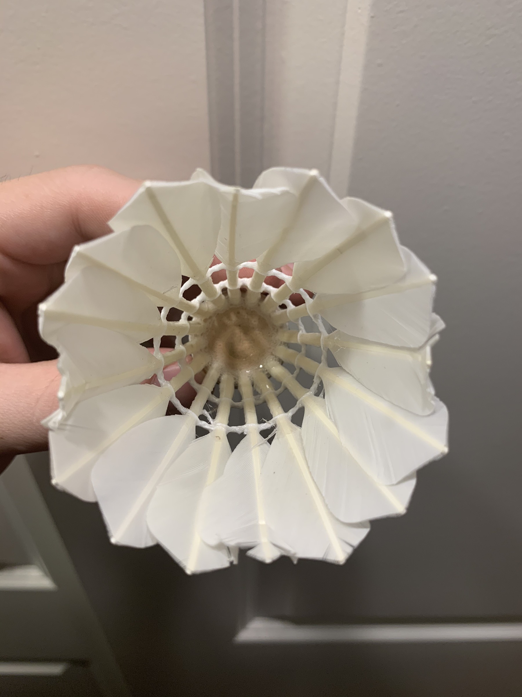 Shuttlecock that is tipped inwards to make its speed greater. 
