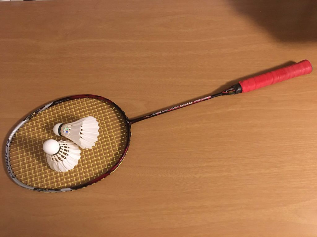 Racket and Shuttlecocks